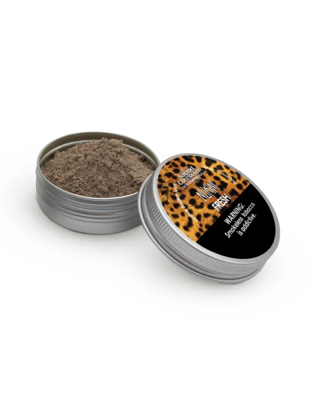 Rapé Nukini – Fresh (eucalyptus) – boîte ouverte avec la poudre, à côté de son couvercle étiqueté