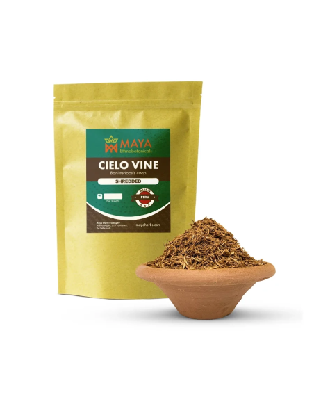 Liane Cielo (Banisteriopsis caapi) – broyée, Pérou – sachet Maya à côté d’un bol de liane broyée