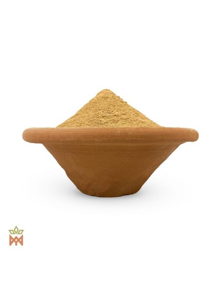 Poudre de racine d’iboga (Tabernanthe iboga) – poudre beige clair dans une coupe en terre cuite