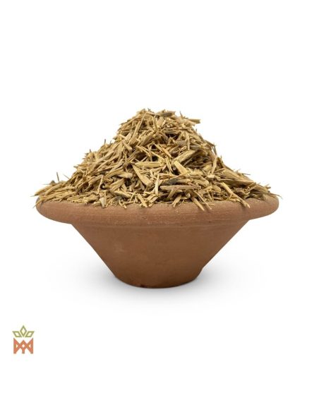 Racine de muira puama effilochée du Brésil (Ptychopetalum olacoides) – éclats de racine clairs dans un bol en terre cuite