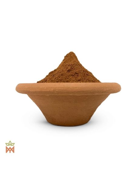Chuchuhuasi du Pérou (Maytenus macrocarpa) – poudre d’écorce brun rouge dans un bol en terre cuite